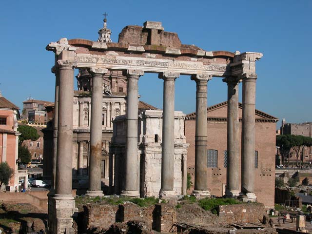 Il Tempio di Saturno con a sinistra il Carcere Mamertino ed in fondo la Chiesa dei Ss. Luca e Martina, l'Arco di Settimio Severo e la Curia Giulia